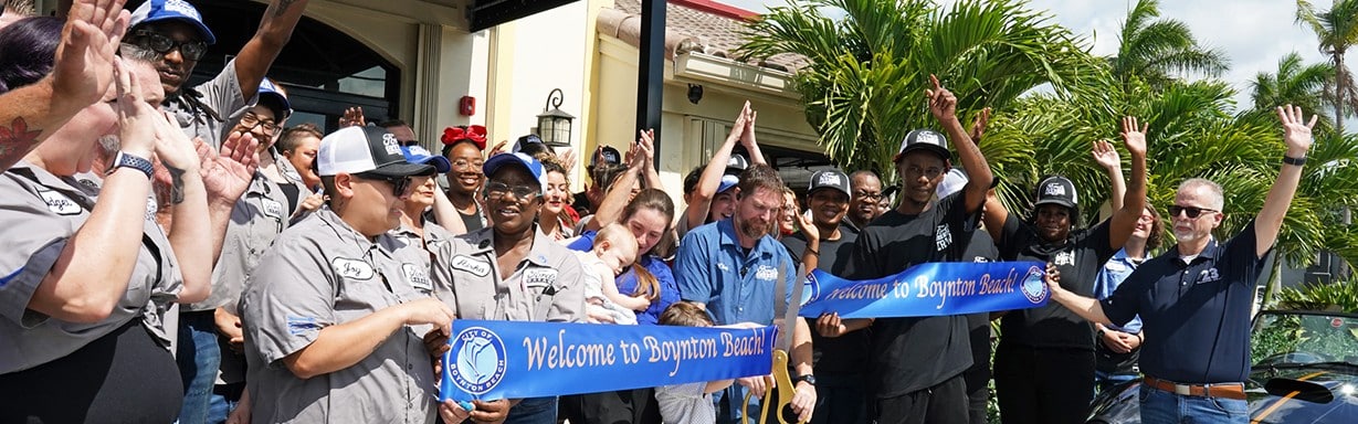 Employees at Ribbon Cutting